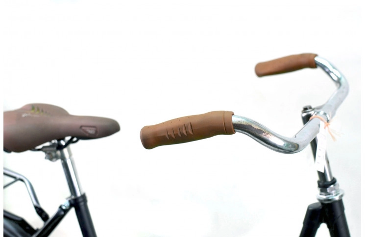 Woman's bicycle On The Road